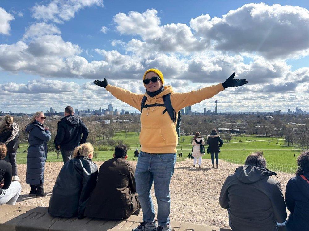 Clara at Primrose Hill with London skyline